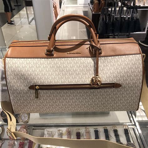 michael kors duffle wickelkleid|michael kors luggage.